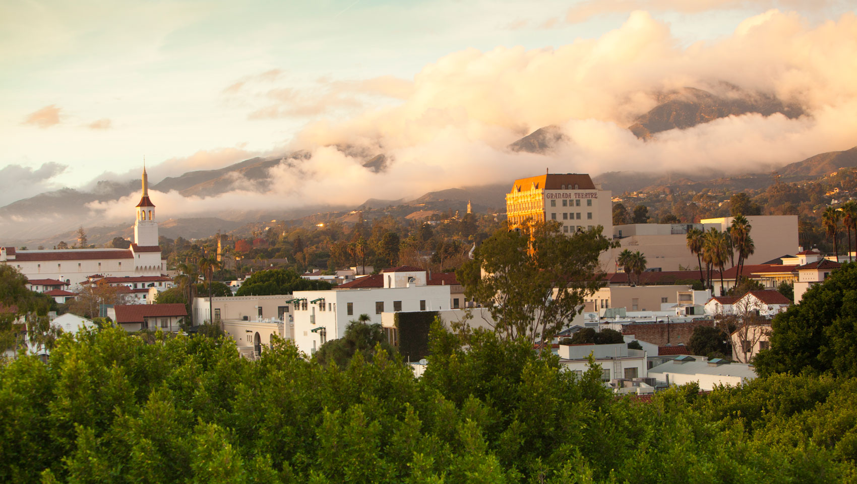 Rooftop view from canary with fog and mountains