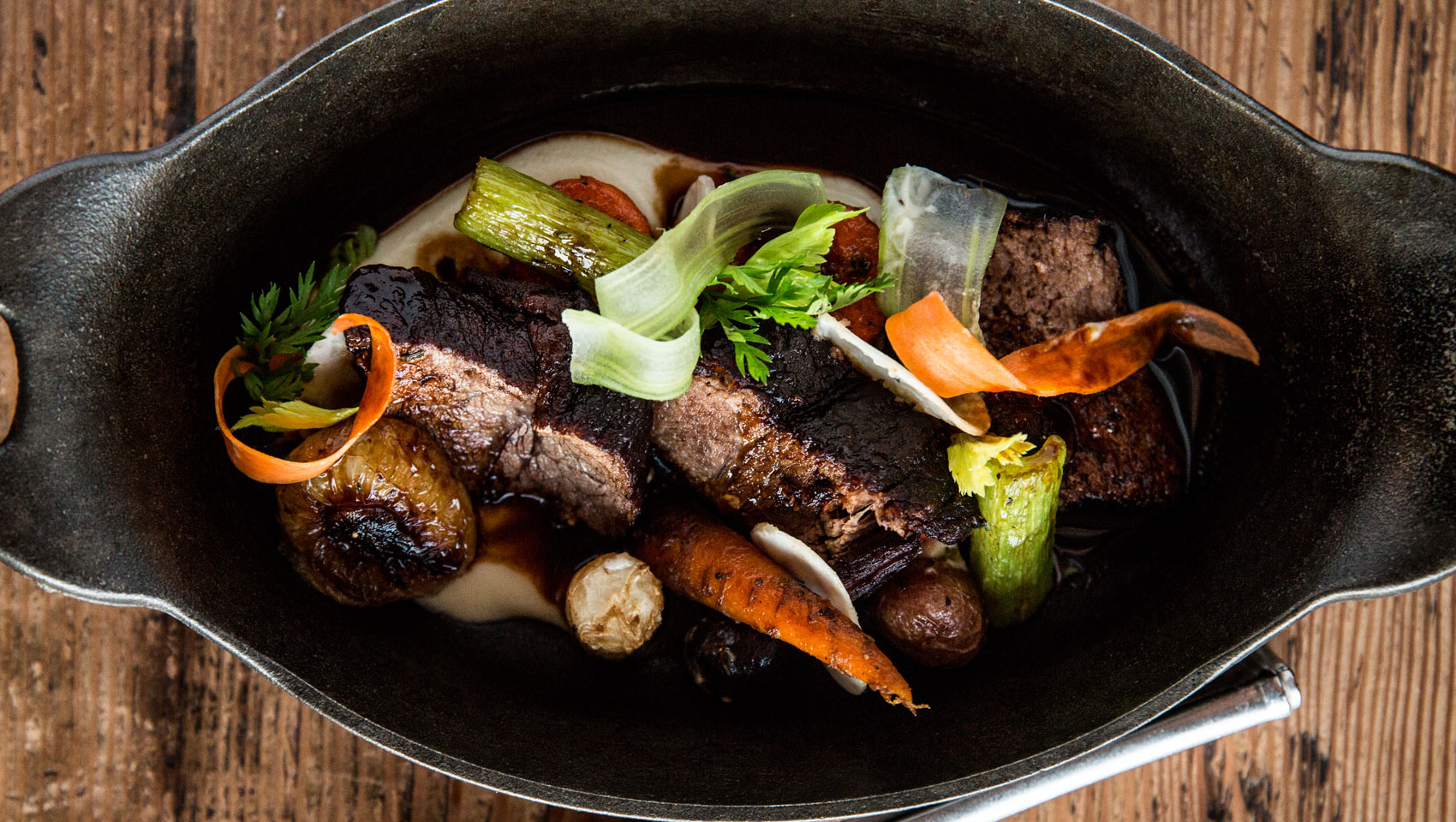 Steak entree in a cast iron skillet