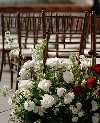 Flowers at rooftop ceremony setting
