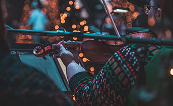 Violinist in holiday sweater