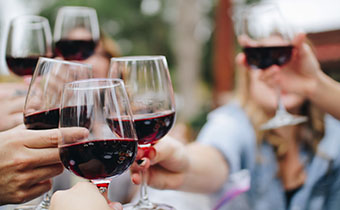 Group toasting with wine